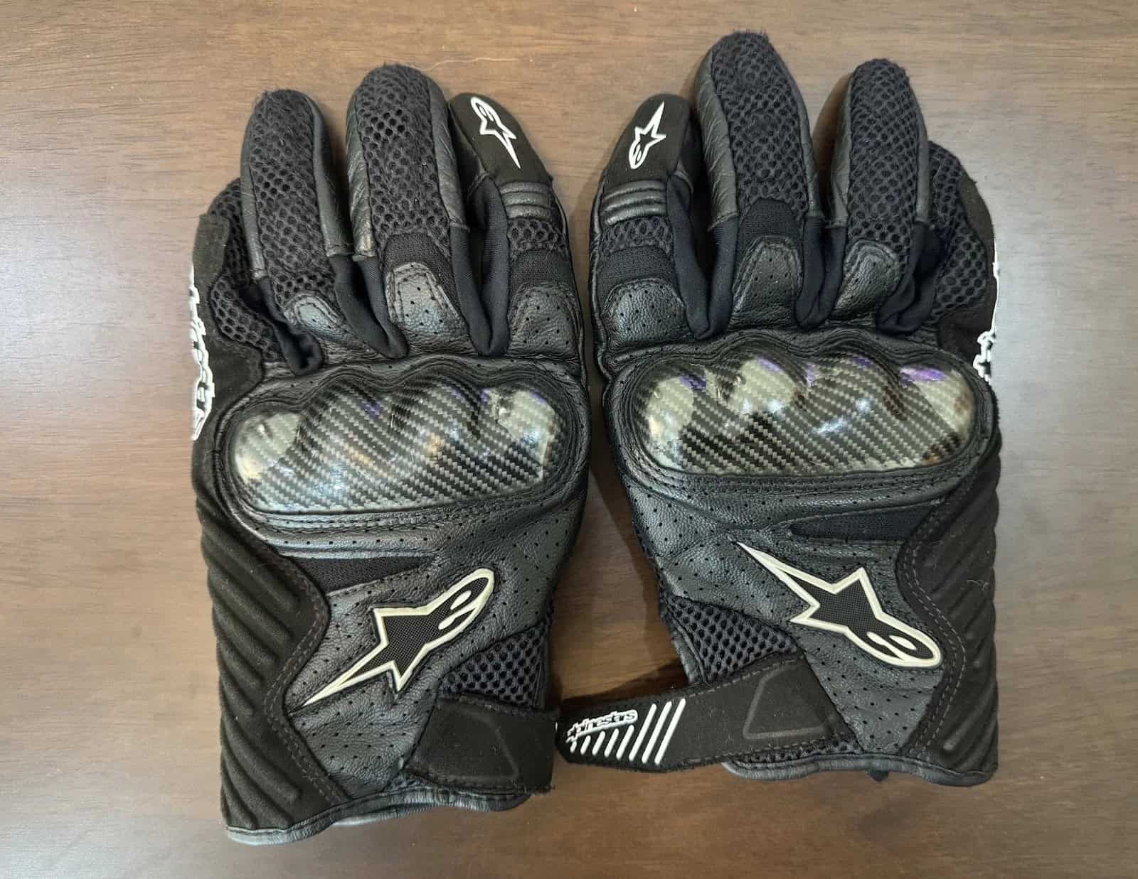Alpinestars SMX-1 Air V2 black motorcycle gloves with hard knuckle protectors and mesh panels
