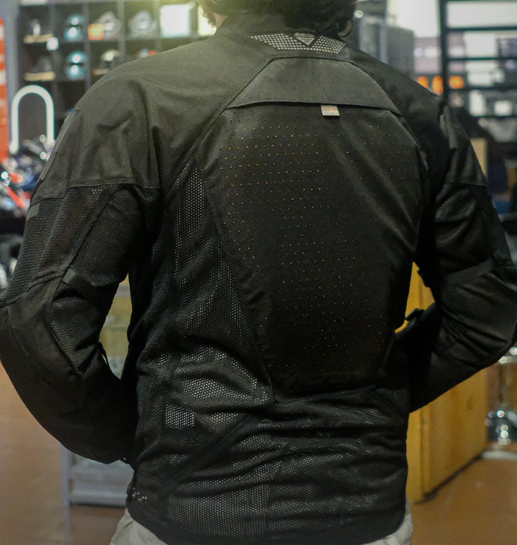 Back view of motorcycle jacket showing pocket for optional back protector