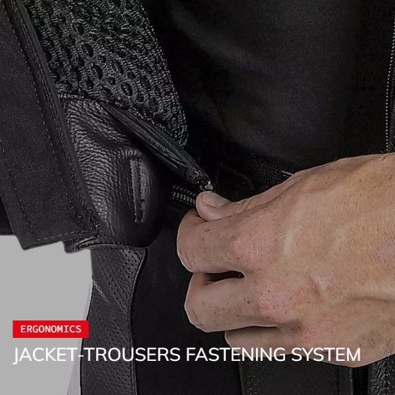Zipping motorcycle jacket to riding pants using a connection zipper