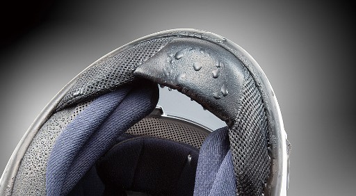 Close-up of Arai Signet-X chin area showing ES chin cover designed to reduce wind noise