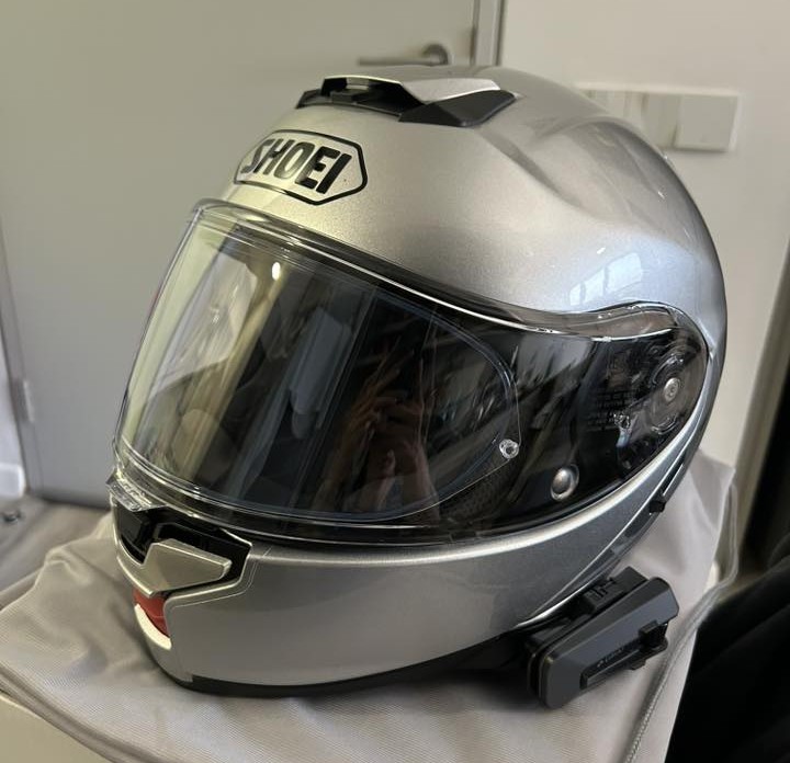 Shoei Neotec 3 helmet with externally mounted Cardo communication unit