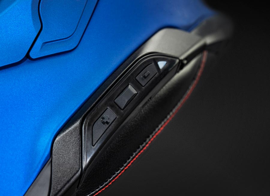 Shoei GT-Air 3 helmet showing integrated controls for Sena SRL3 communication system