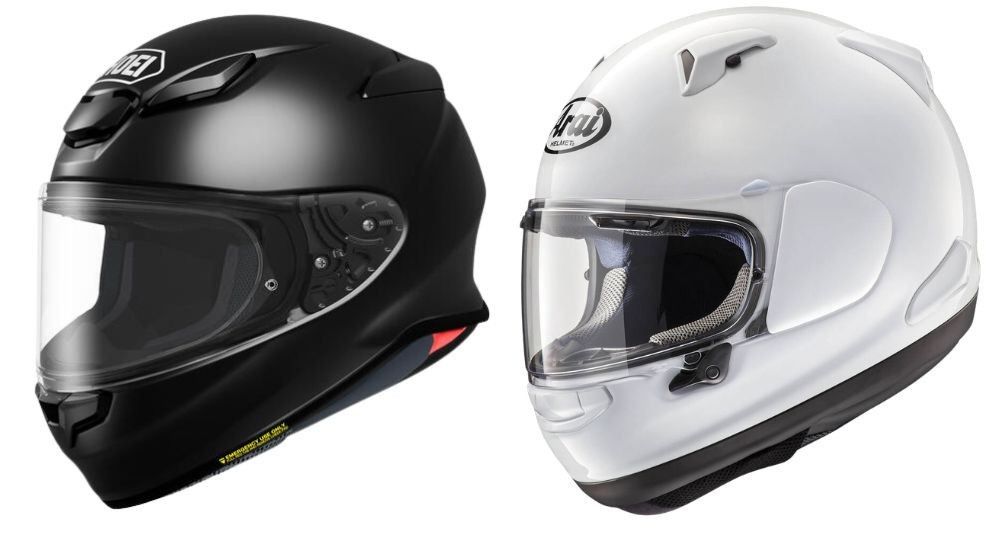 Shoei RF-1400 helmet on the left and Arai Quantum-X helmet on the right